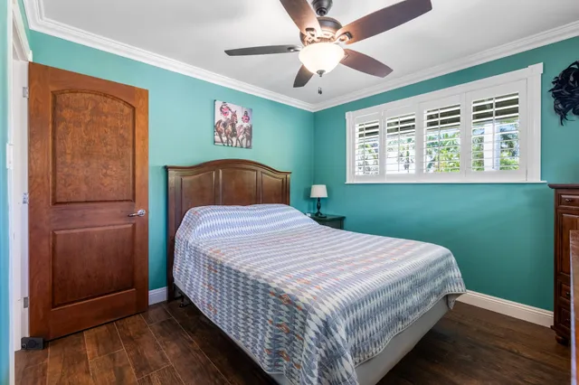 a bed room with a bed and a couch