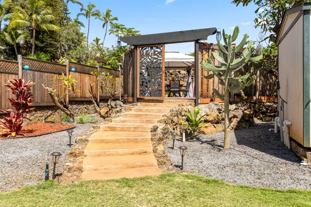 a view of a swimming pool with chairs