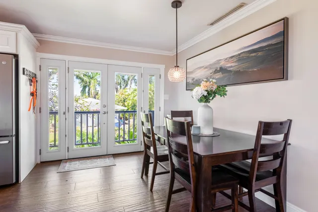 a kitchen with granite countertop stainless steel appliances and a refrigerator