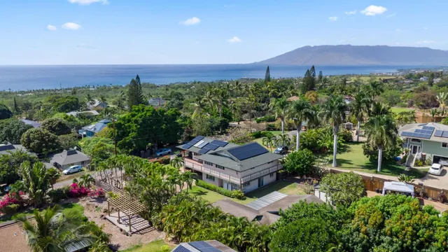 a view of a chairs and table in the patio