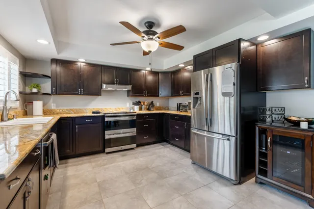an aerial view of a house with garden space and sitting space