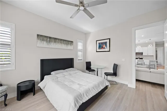 a bedroom with a bed and furniture