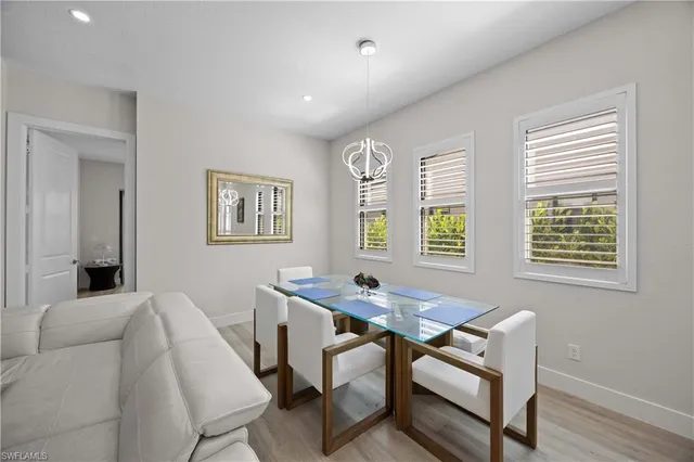 a workspace with furniture and window