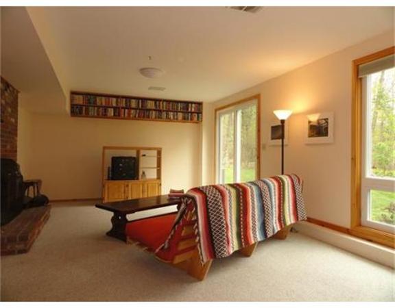127 High Point Drive Amherst, MA 01002 - Photo 25 of 29 a spacious bedroom with a bed and window