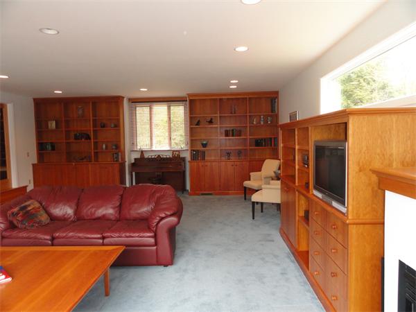 127 High Point Drive Amherst, MA 01002 - Photo 6 of 29 a living room with furniture a window and a flat screen tv