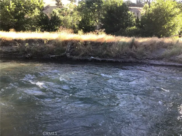 a view of a yard next to a yard