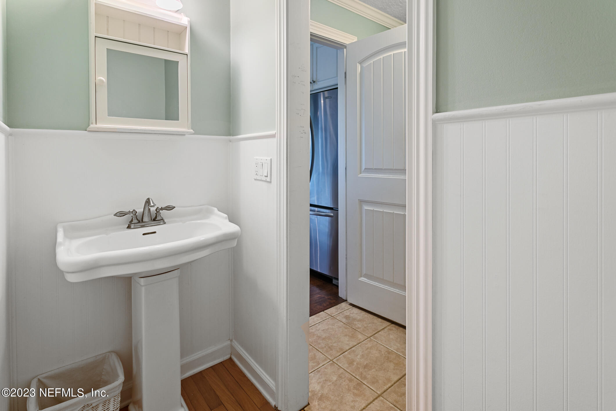 1 Hopson Road Jacksonville Beach, FL 32250 - Photo 20 of 58 a bathroom with a sink and a mirror