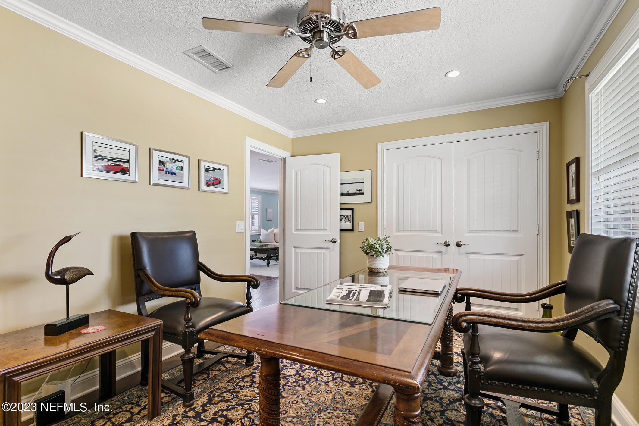 1 Hopson Road Jacksonville Beach, FL 32250 - Photo 27 of 58 a workspace with furniture and chandelier