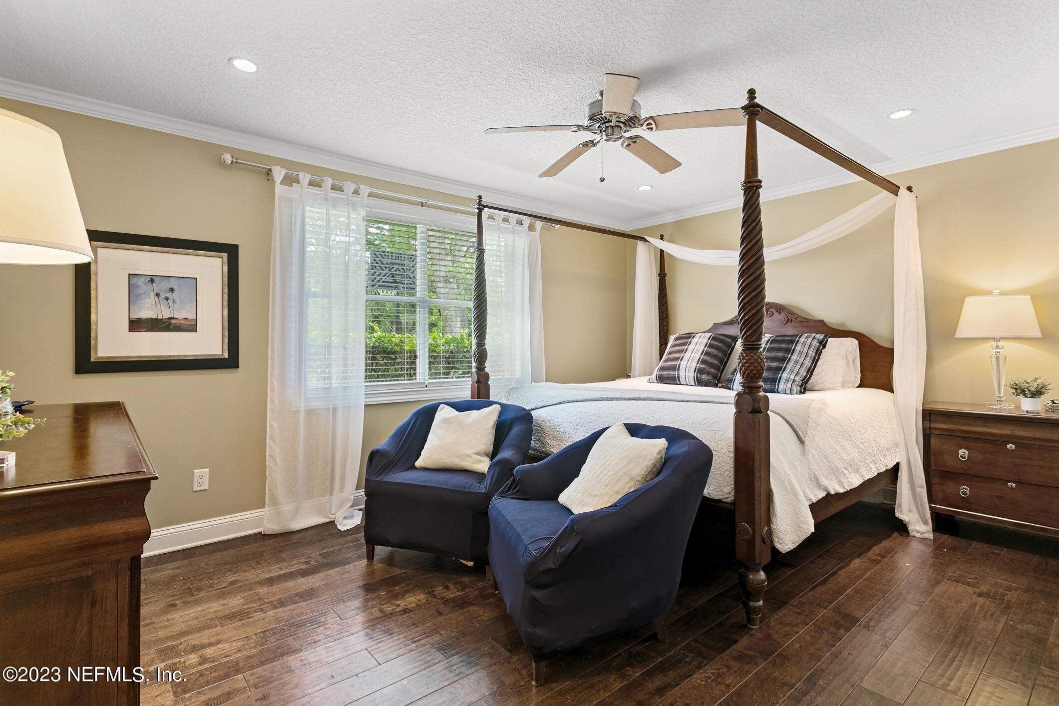 1 Hopson Road Jacksonville Beach, FL 32250 - Photo 30 of 58 a spacious bedroom with a bed a couch and dresser