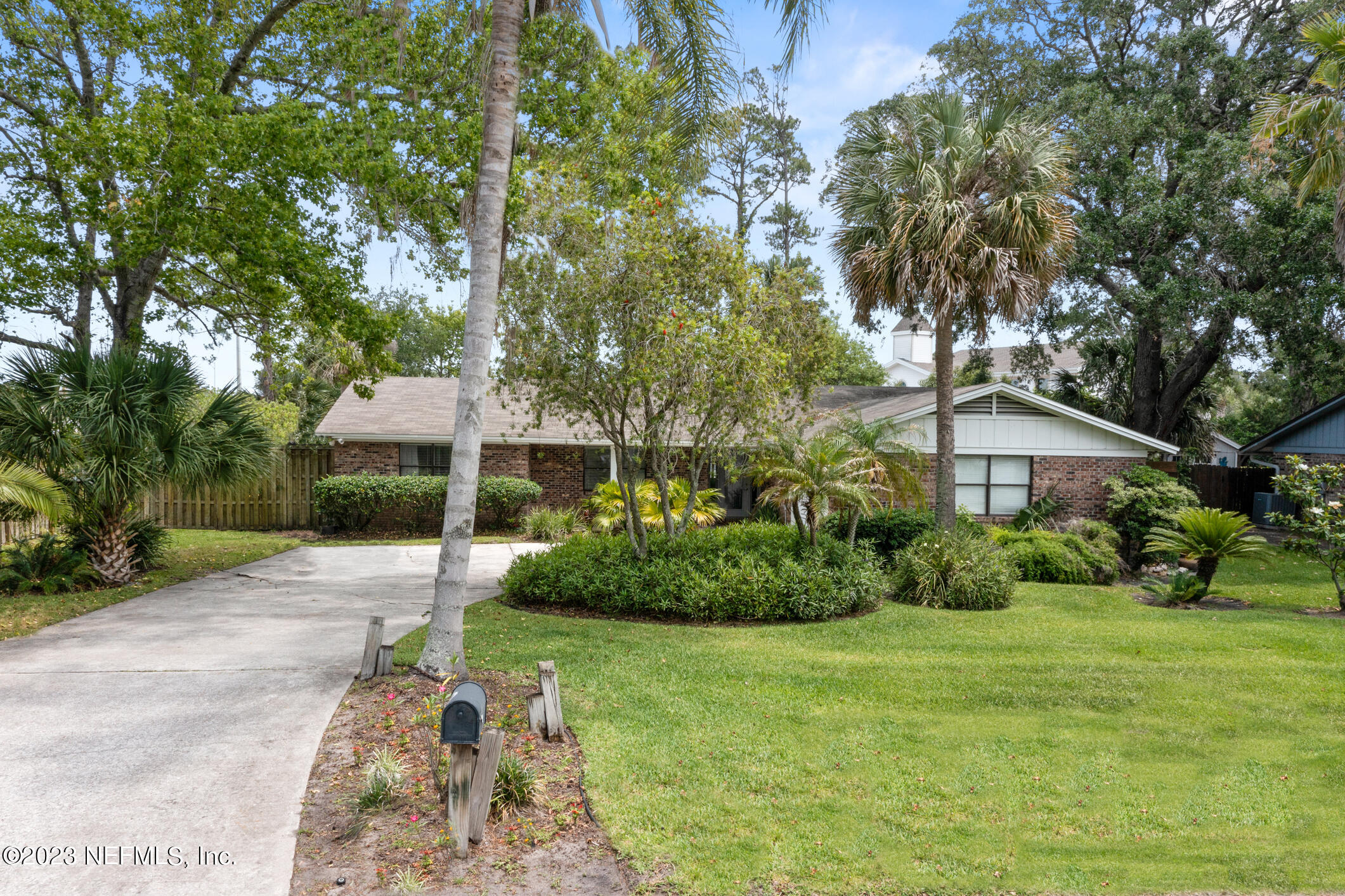 1 Hopson Road Jacksonville Beach, FL 32250 - Photo 3 of 58 a front view of a house with a yard