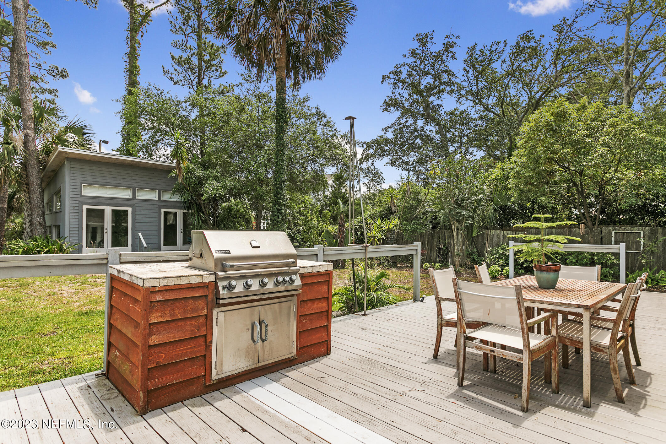 1 Hopson Road Jacksonville Beach, FL 32250 - Photo 40 of 58 a view of a chairs and table on the deck
