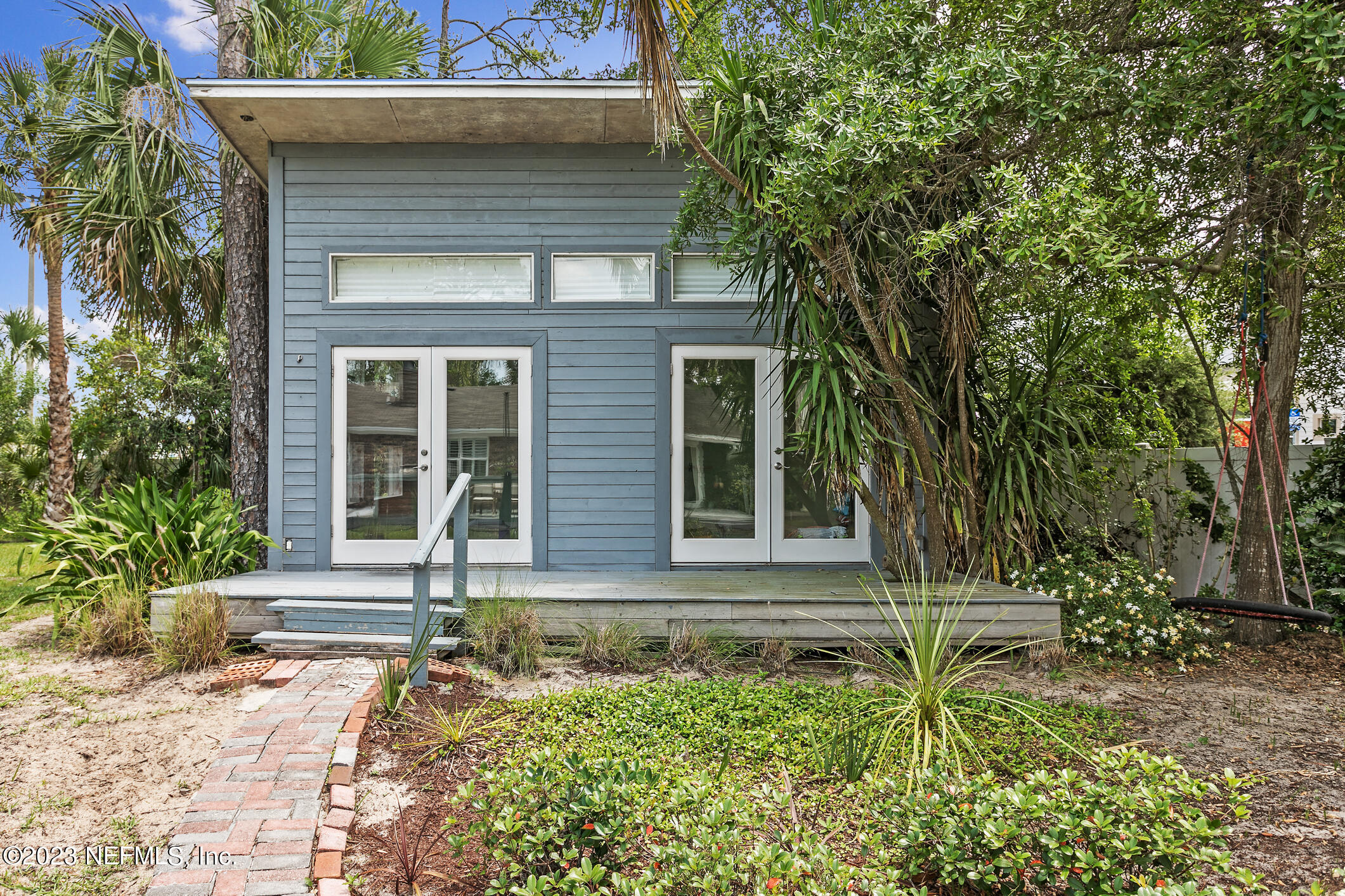 1 Hopson Road Jacksonville Beach, FL 32250 - Photo 44 of 58 a front view of a house with a yard