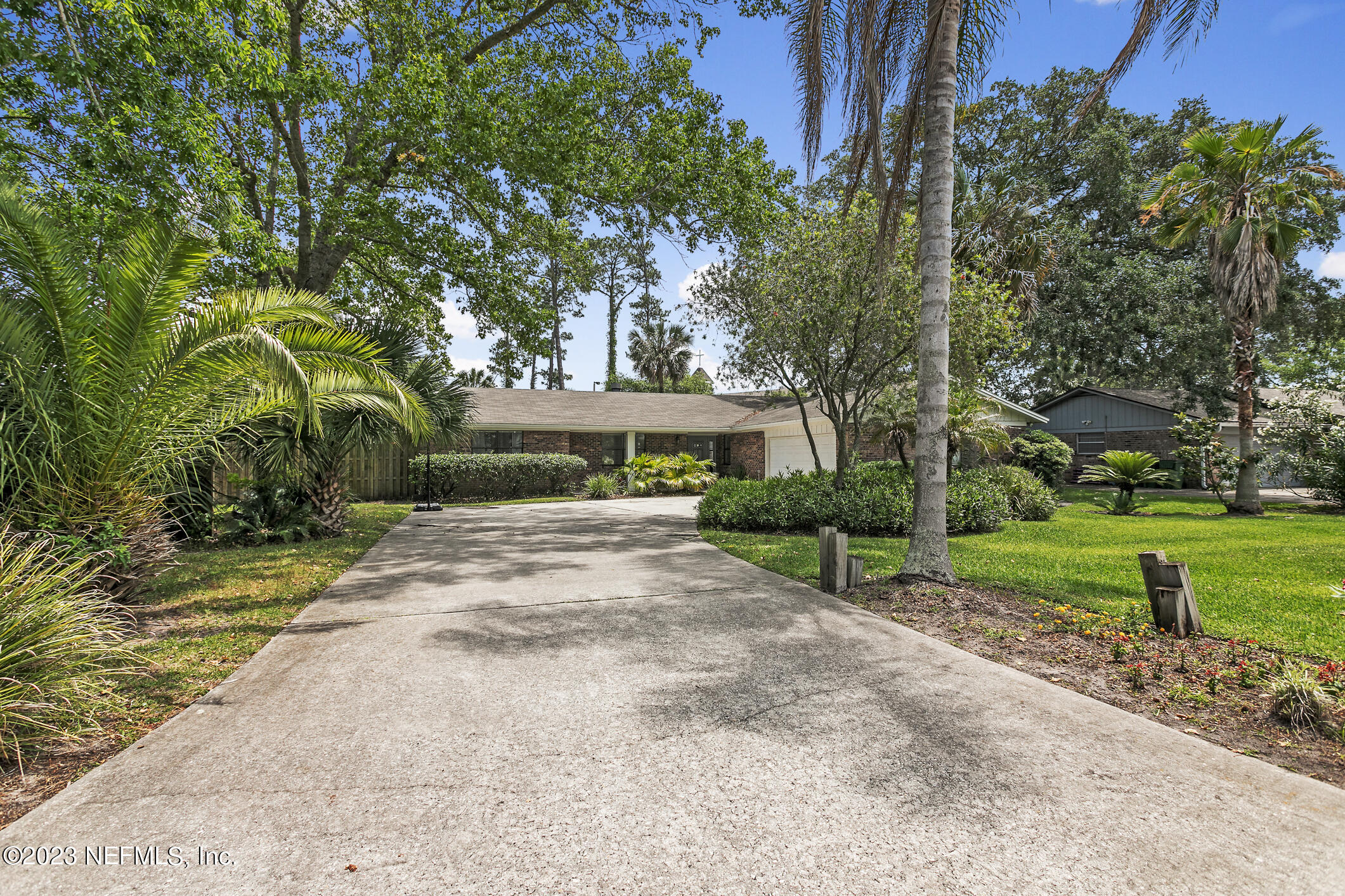 1 Hopson Road Jacksonville Beach, FL 32250 - Photo 49 of 58 a view of house with a yard