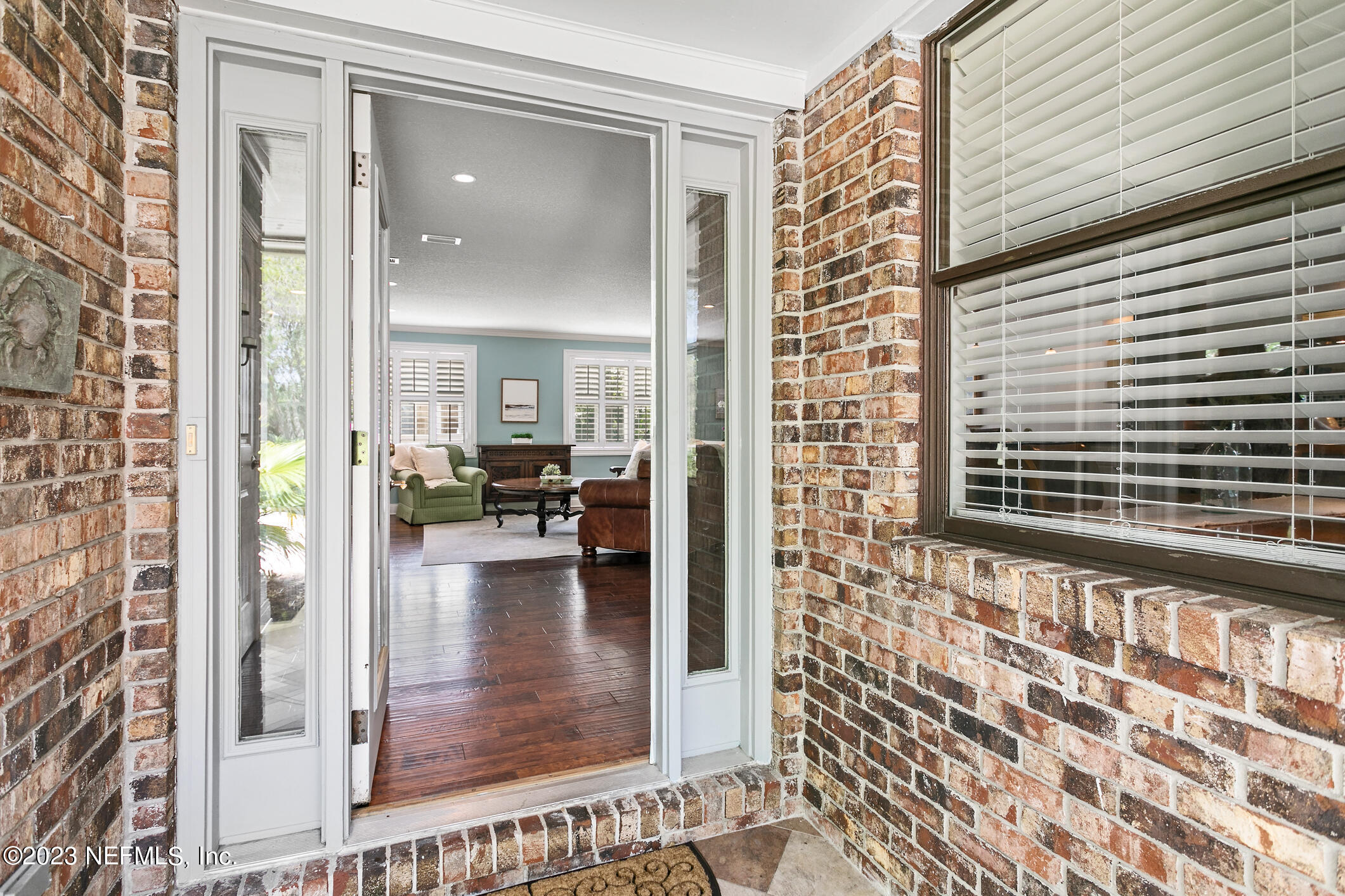 1 Hopson Road Jacksonville Beach, FL 32250 - Photo 5 of 58 a view of livingroom with furniture and floor to ceiling window