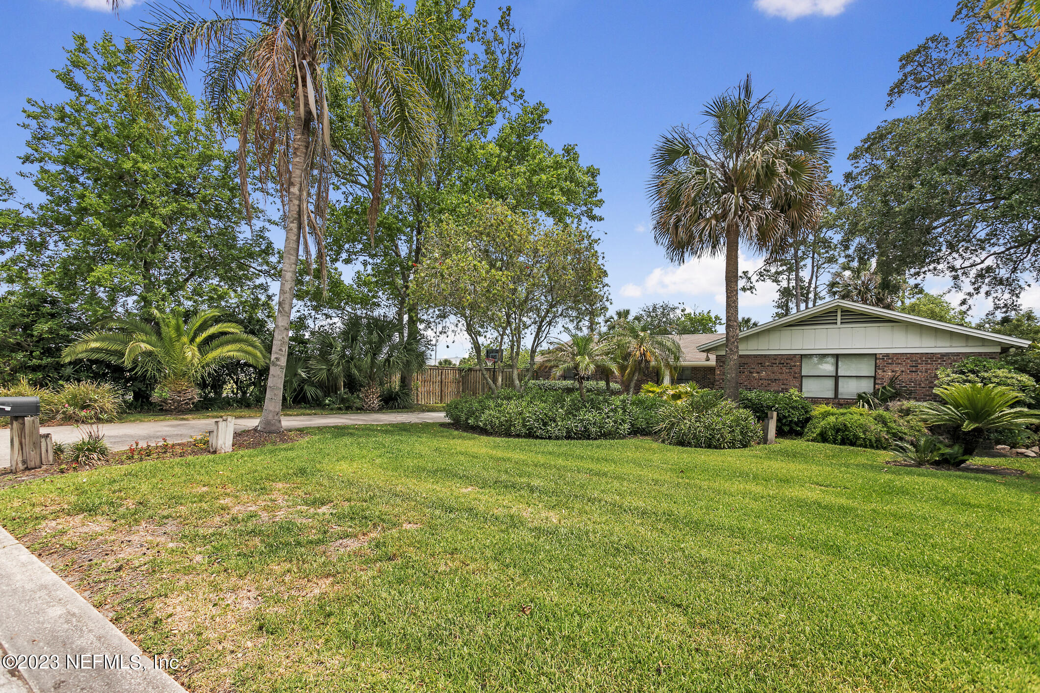 1 Hopson Road Jacksonville Beach, FL 32250 - Photo 51 of 58 a view of a patio with a yard