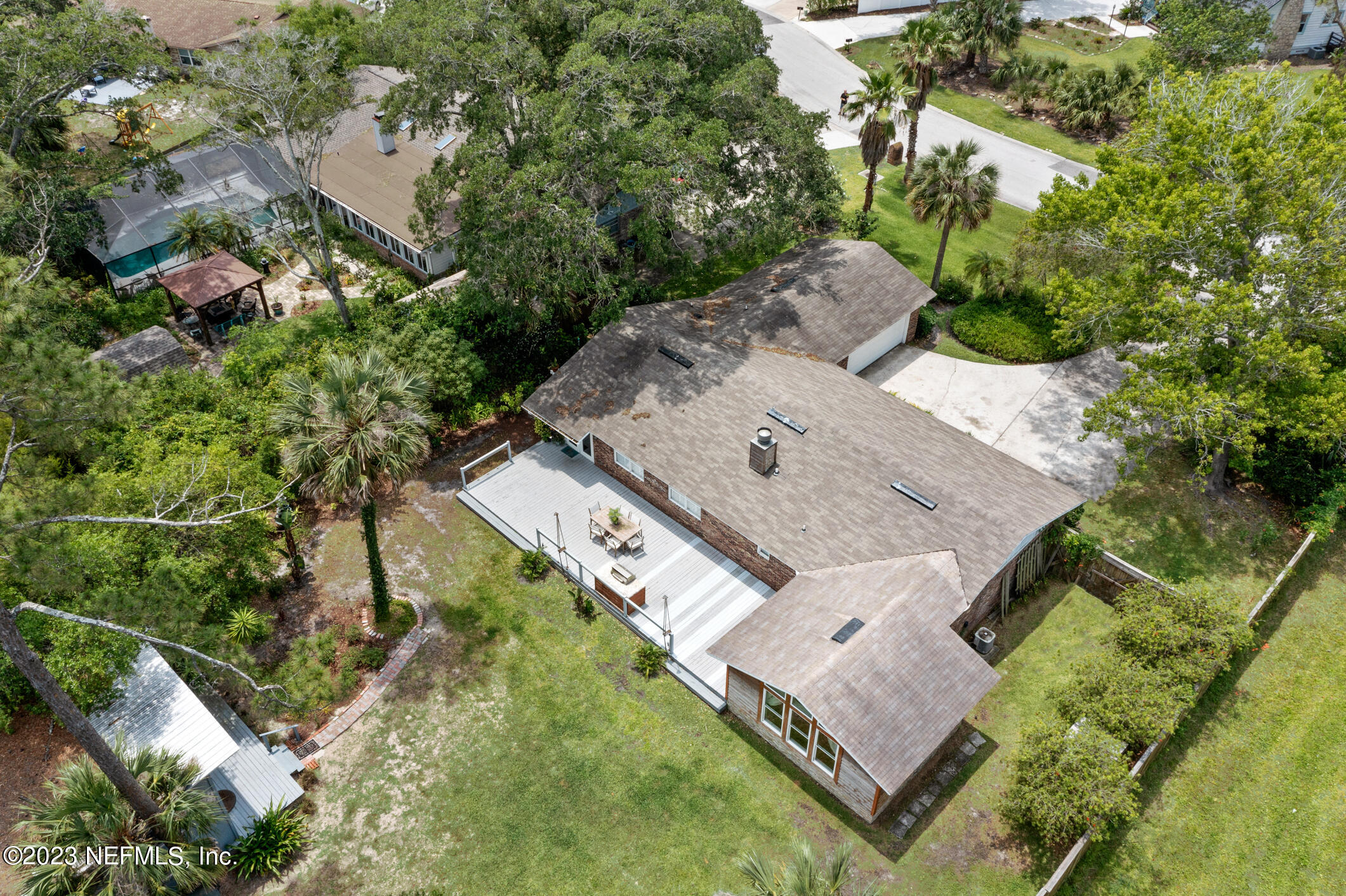 1 Hopson Road Jacksonville Beach, FL 32250 - Photo 54 of 58 an aerial view of a house with a yard