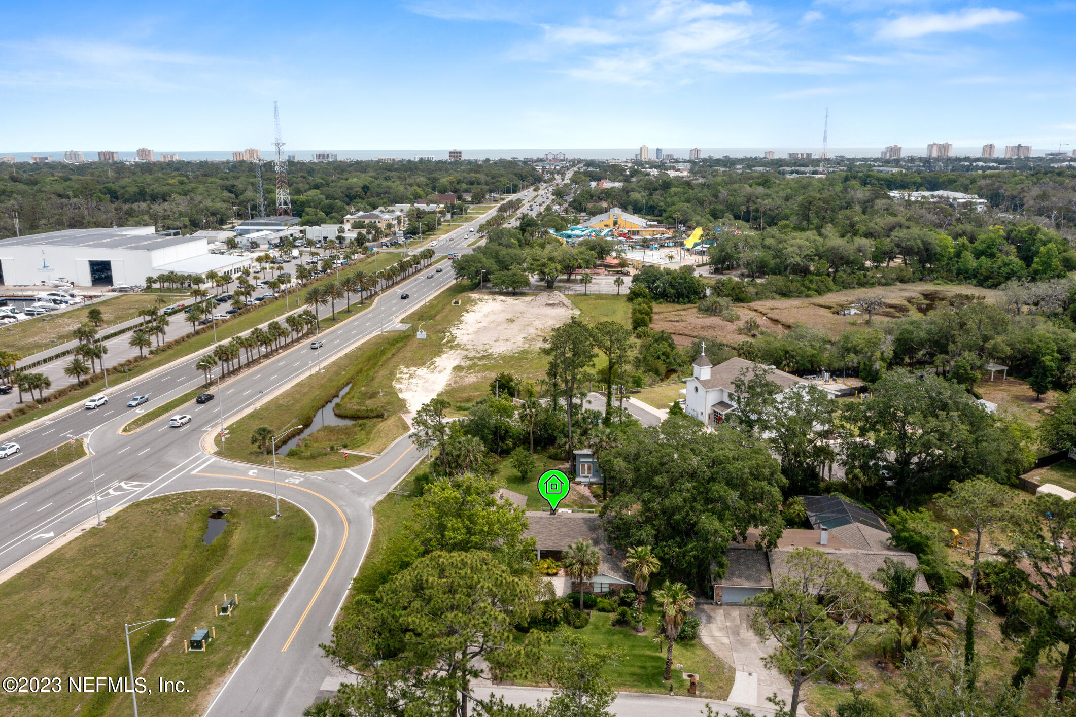 1 Hopson Road Jacksonville Beach, FL 32250 - Photo 55 of 58 an aerial view of residential houses with outdoor space