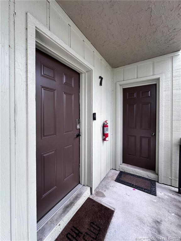 800 Northwest Fork Road, Unit 107 Stuart, FL 34994 - Photo 12 of 21 a view of elevator with hallway