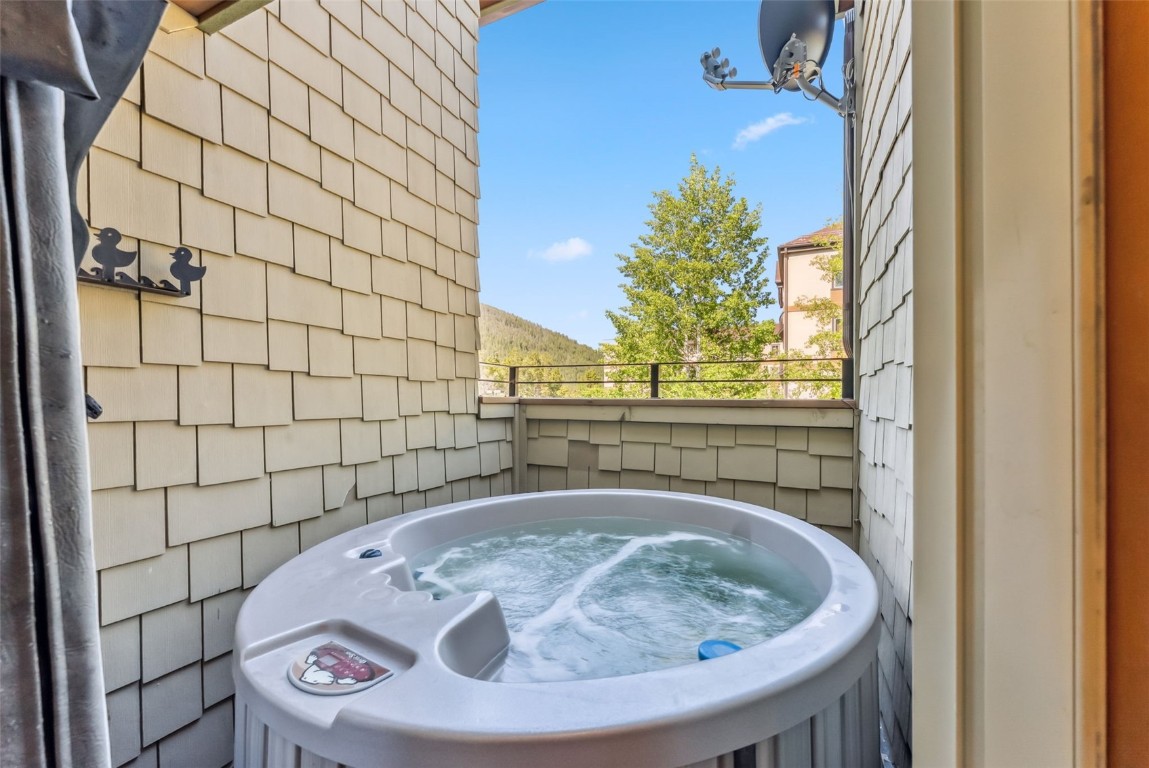24 Rasor Drive, Unit 24 Keystone, CO 80435 - Photo 11 of 29 a bathroom with a sink and mirror