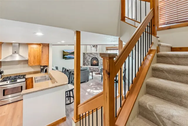 a bathroom with a toilet sink and a mirror