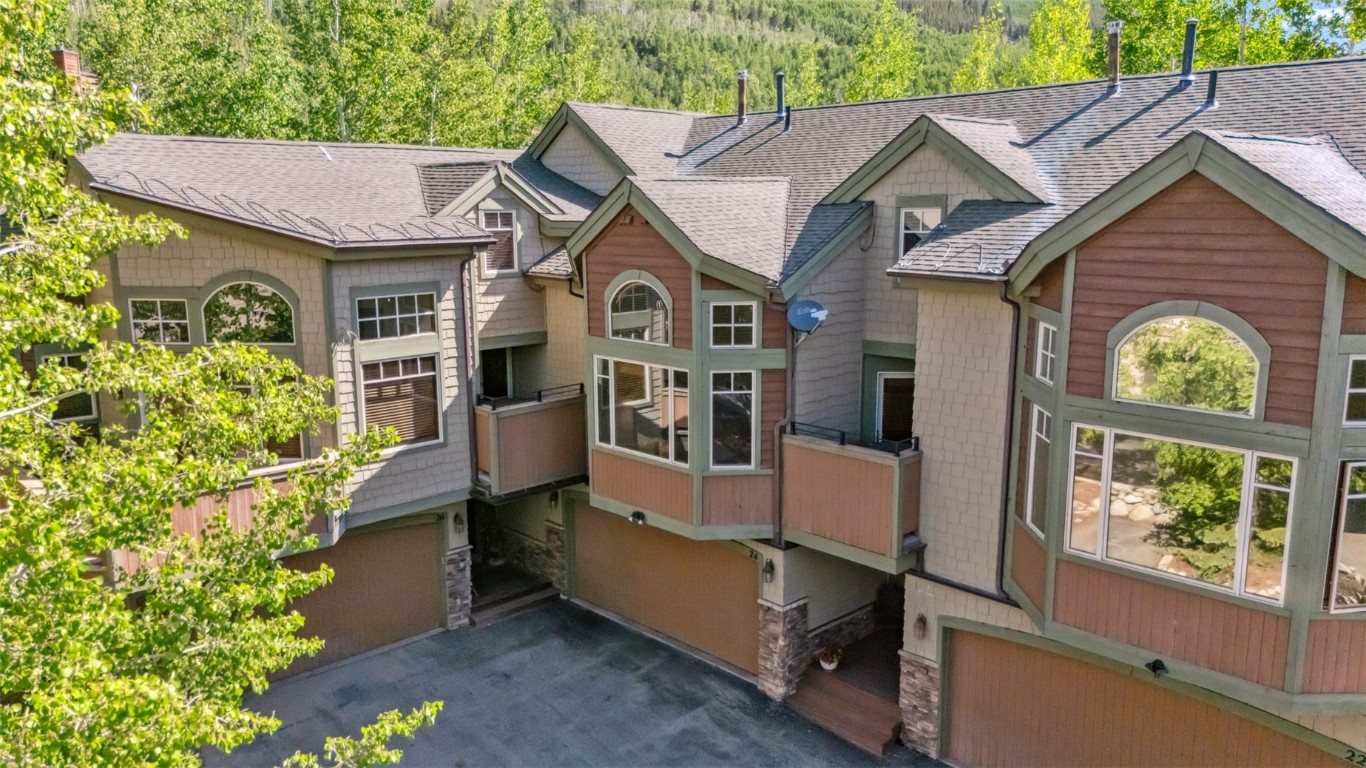 24 Rasor Drive, Unit 24 Keystone, CO 80435 - Photo 25 of 29 a front view of a house with a garden