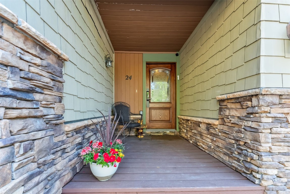 24 Rasor Drive, Unit 24 Keystone, CO 80435 - Photo 6 of 29 a front view of a house with outdoor seating