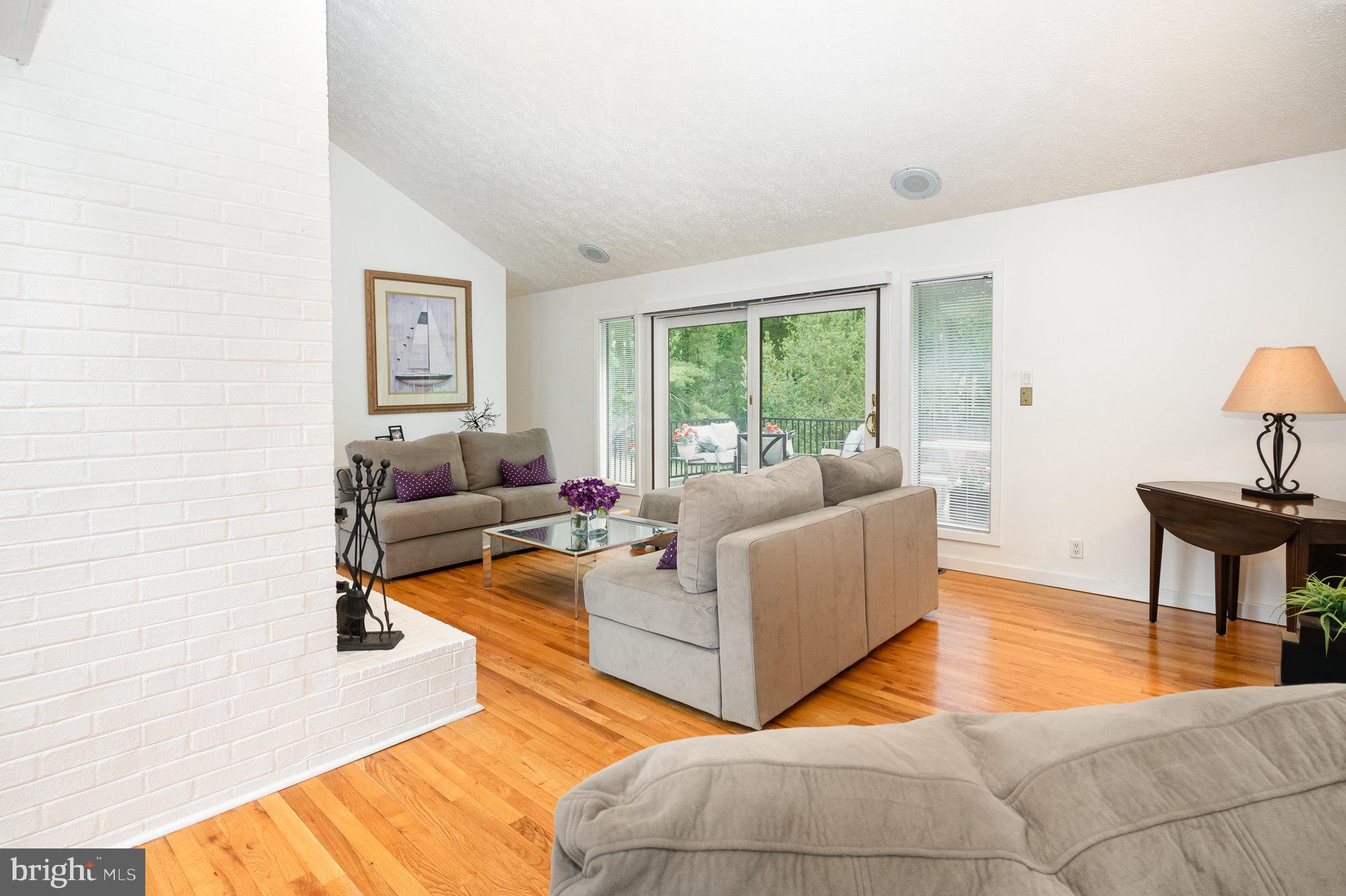 16222 Hampton Road Hamilton, VA 20158 - Photo 8 of 35 a living room with furniture and a large window
