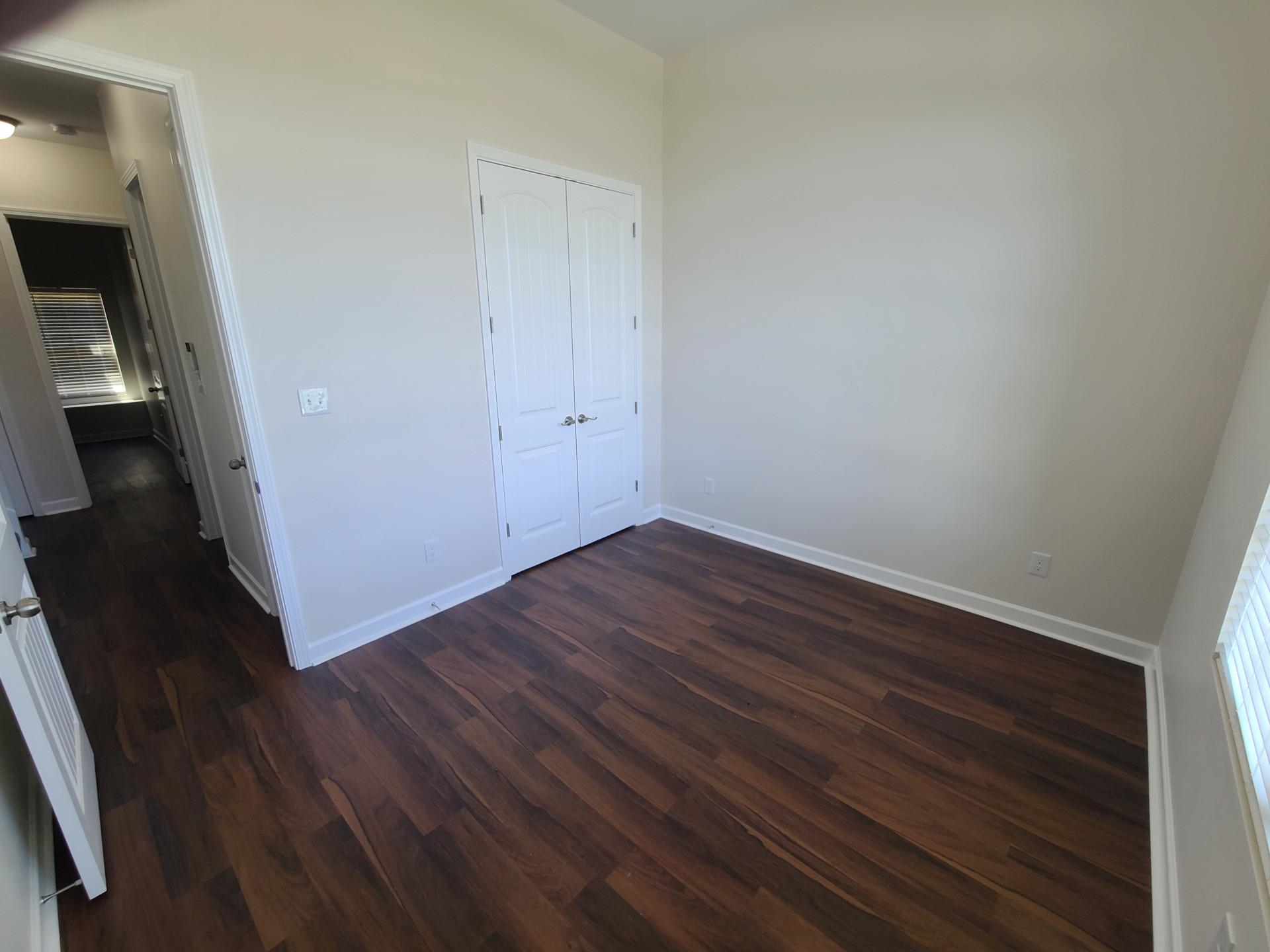 3045 Frayser-Raleigh Road Memphis, TN 38128 - Photo 4 of 22 a view of a hallway with wooden floor