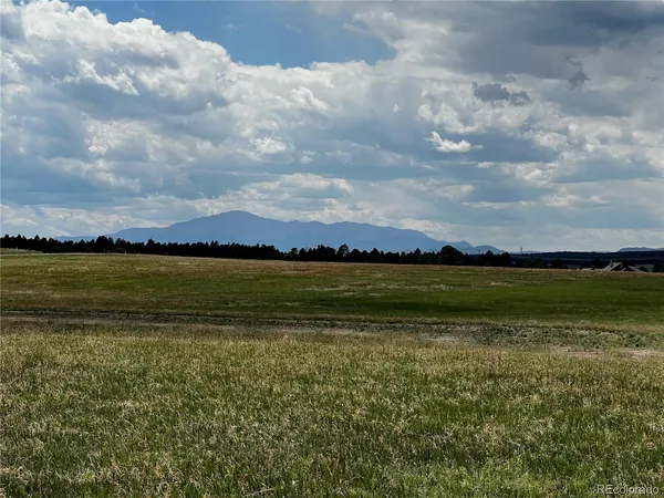 a view of a lake and mountain in the back