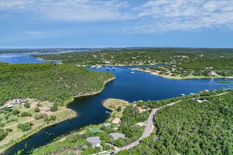 a view of a lake with a building in the background