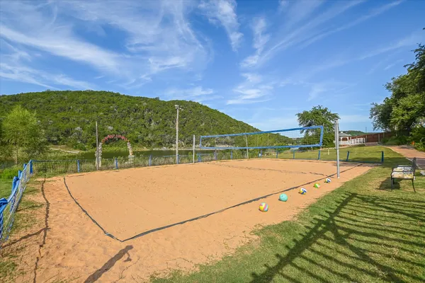 a view of an outdoor space and tennis court