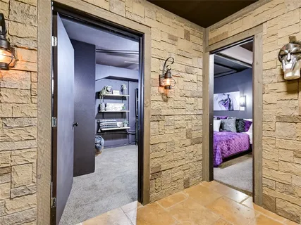 a view of wooden door and bedroom