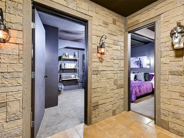 a view of wooden door and bedroom
