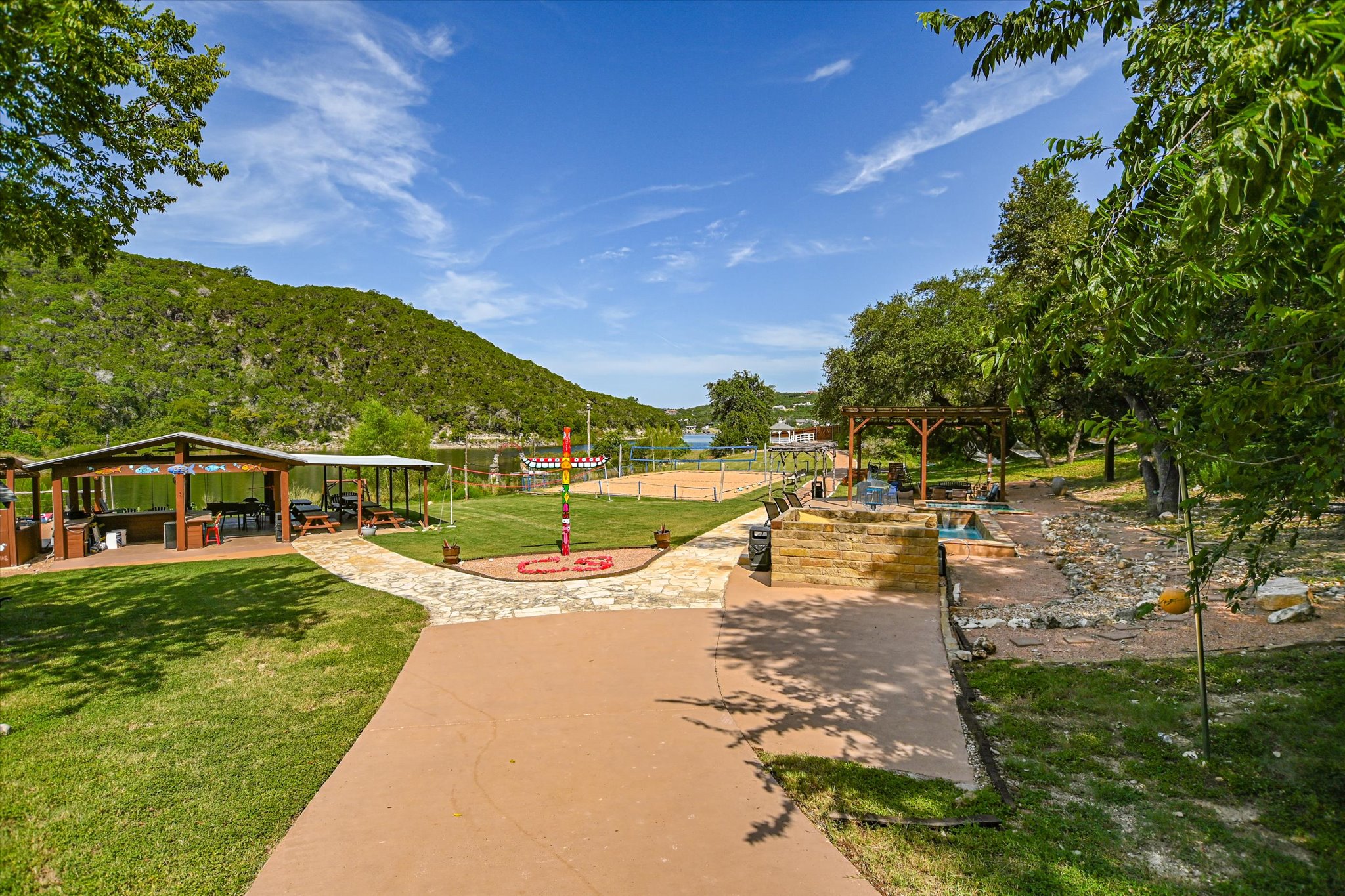 13401 Bullick Hollow Road Austin, TX 78726 - Photo 7 of 40 a view of a swimming pool with a lake view