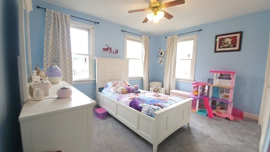60 Marble Road Sutton, MA 01590 - Photo 13 of 21 a bedroom with furniture and a chandelier