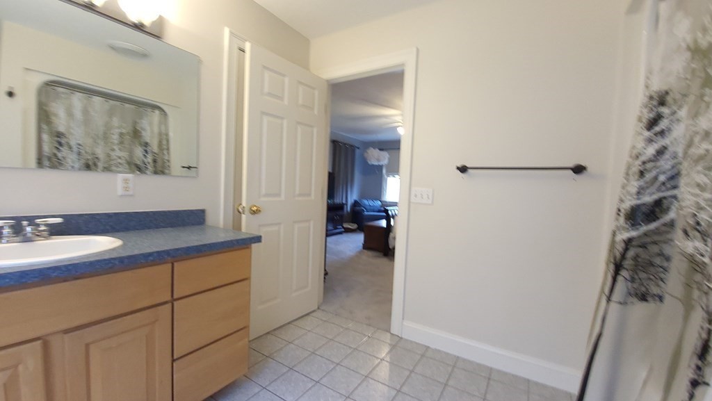 60 Marble Road Sutton, MA 01590 - Photo 16 of 21 a bathroom with a sink and a mirror
