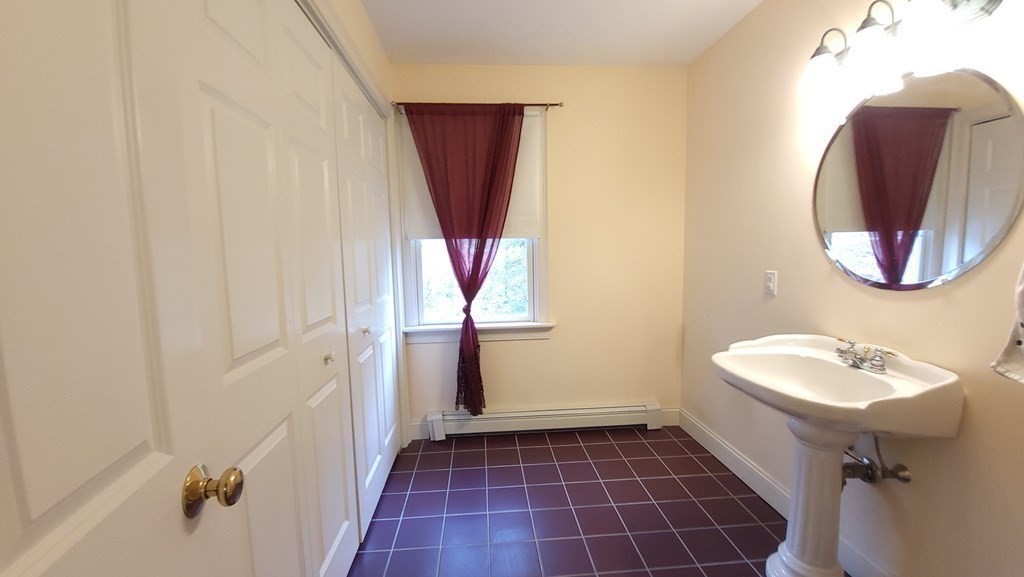 60 Marble Road Sutton, MA 01590 - Photo 21 of 21 a bathroom with a sink and a mirror