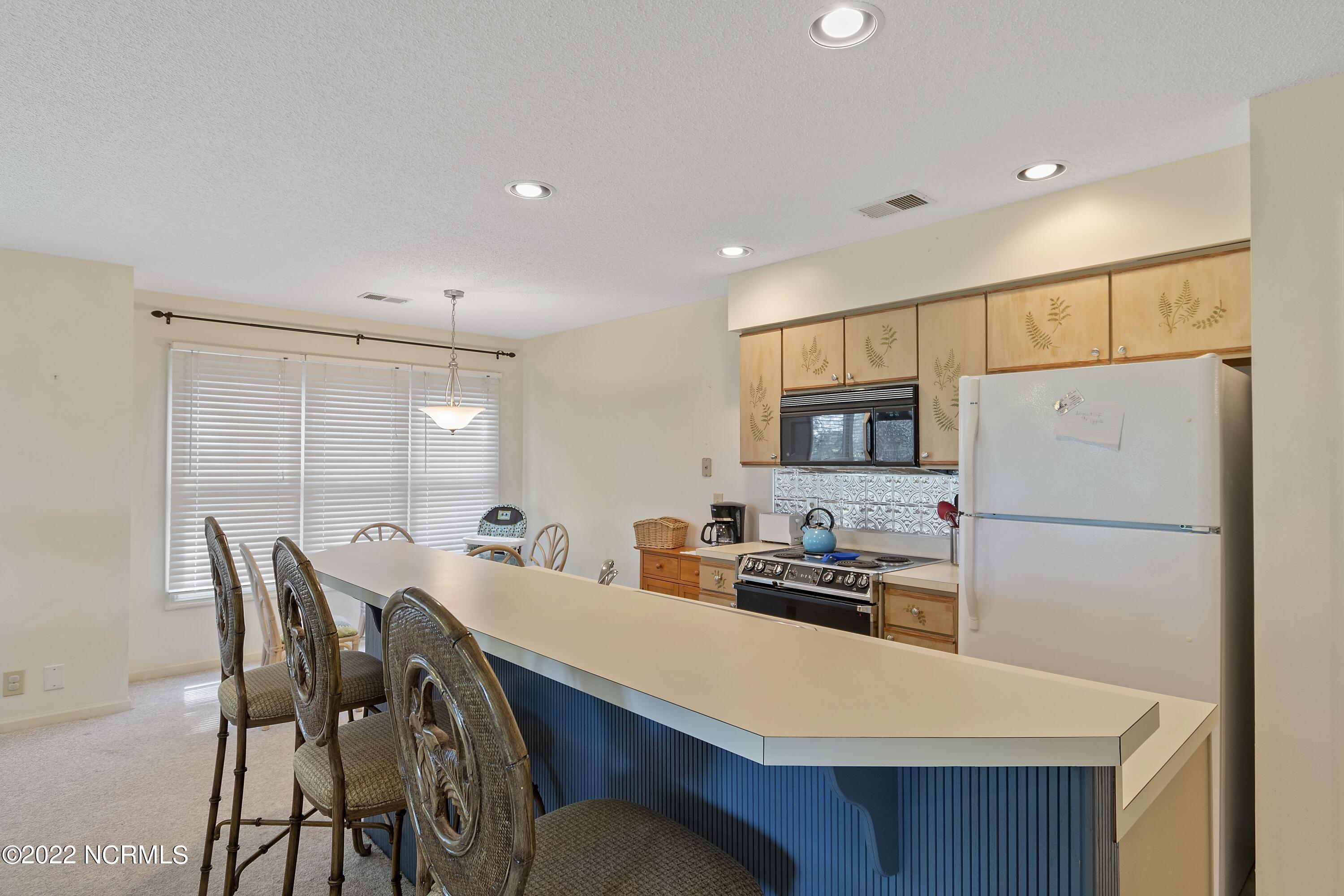223 Clubhouse Road, Unit 4 Sunset Beach, NC 28468 - Photo 4 of 42 Kitchen