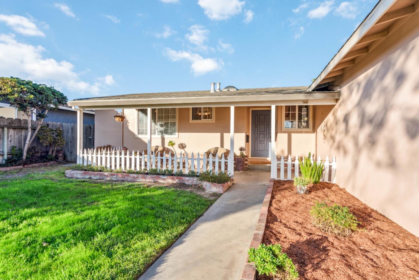 440 Comanche Way Salinas, CA 93906 - Photo 1 of 1 a front view of a house with a garden