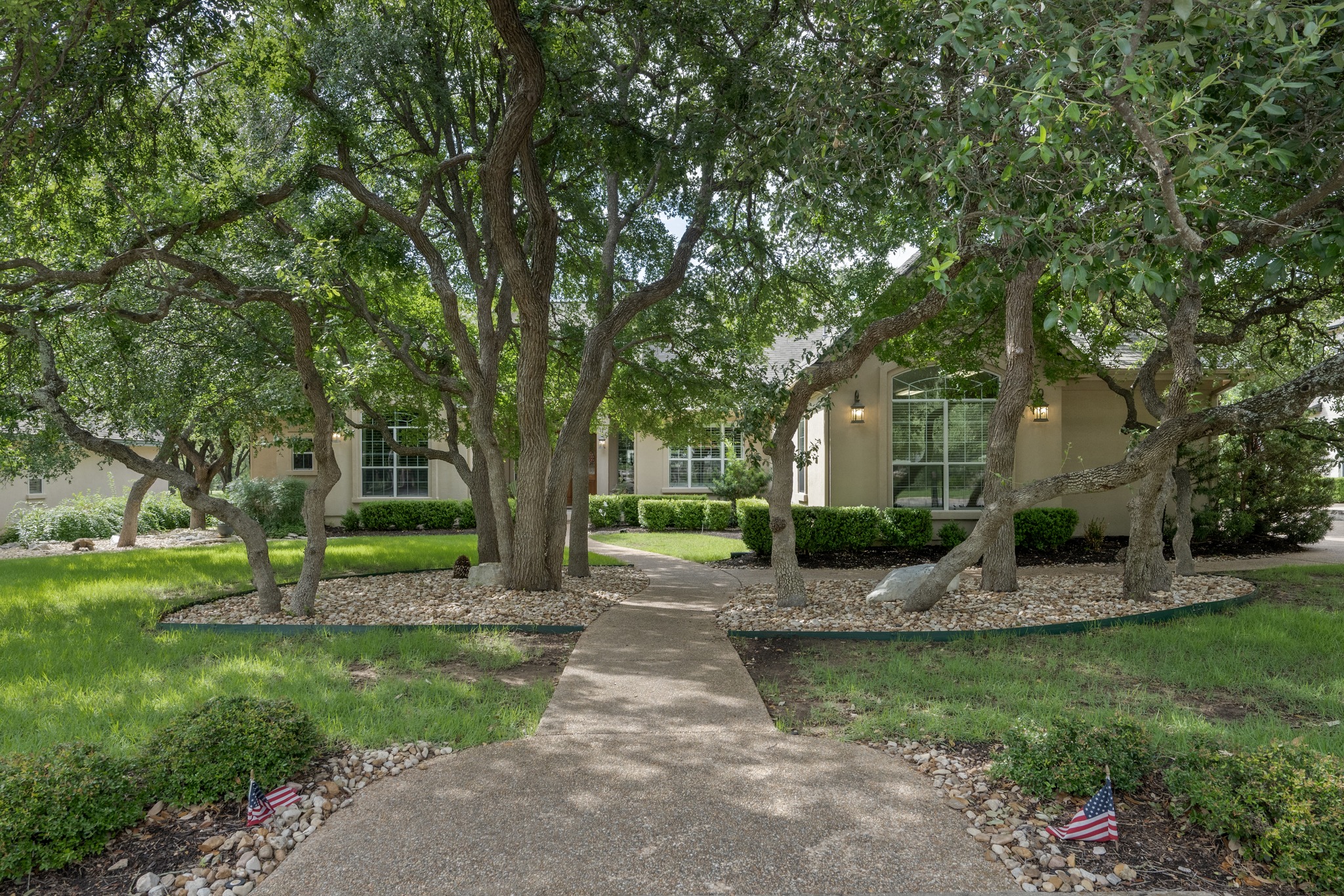 29 Meadows End Georgetown, TX 78628 - Photo 1 of 38 a front view of a house with garden and trees