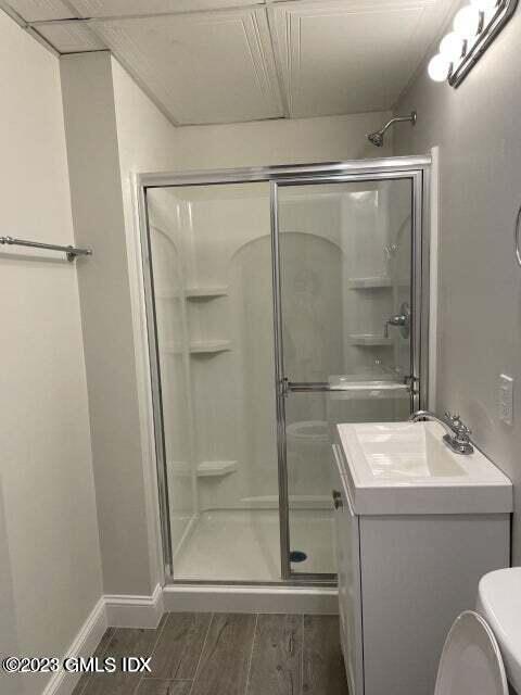 8 Sound Beach Ave Extension, Unit 2 Riverside, CT 06878 - Photo 22 of 29 a bathroom with a shower a sink and a mirror