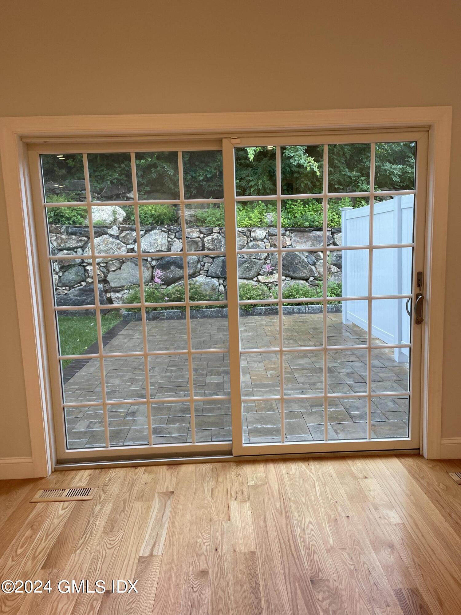 8 Sound Beach Ave Extension, Unit 2 Riverside, CT 06878 - Photo 23 of 29 a view of outdoor space with windows