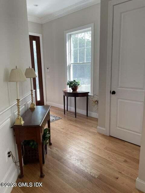 8 Sound Beach Ave Extension, Unit 2 Riverside, CT 06878 - Photo 4 of 29 a view of a workspace with furniture and wooden floor
