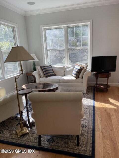 8 Sound Beach Ave Extension, Unit 2 Riverside, CT 06878 - Photo 5 of 29 a living room with furniture and a window