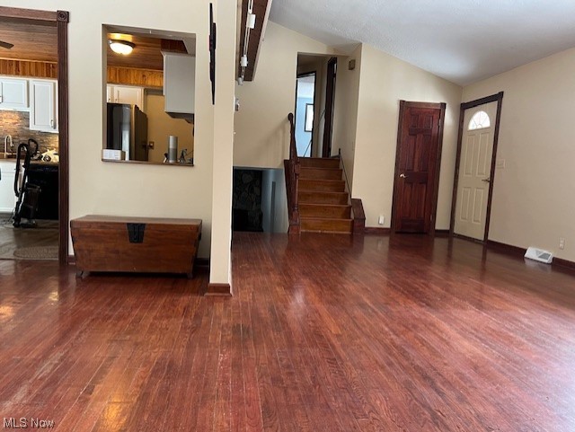 10157 Ravenna Road Chardon, OH 44024 - Photo 25 of 34 Entryway with vaulted ceiling and dark hardwood / wood-style floors