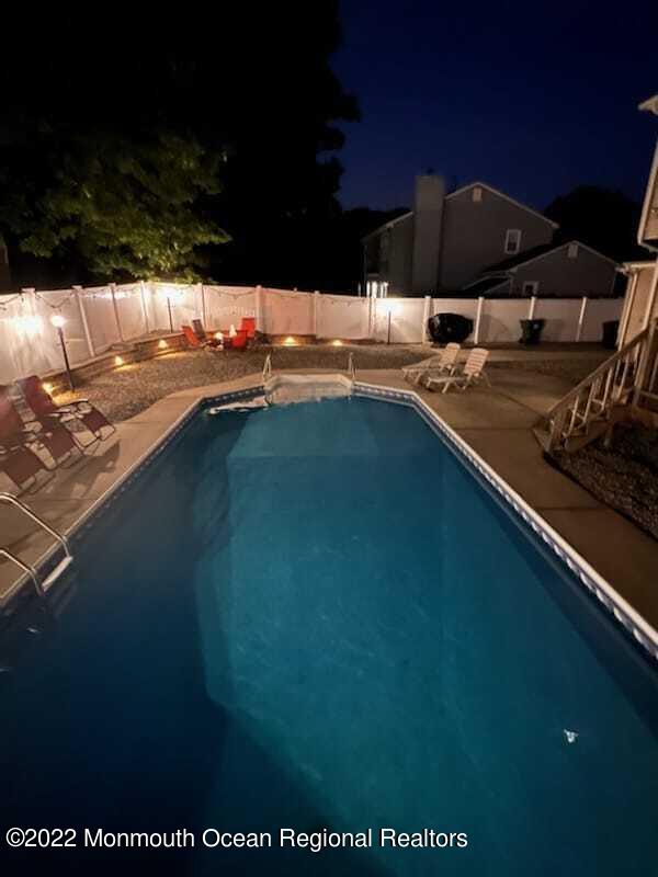 33 Metedeconk Road Howell, NJ 07731 - Photo 38 of 38 Backyard at night
