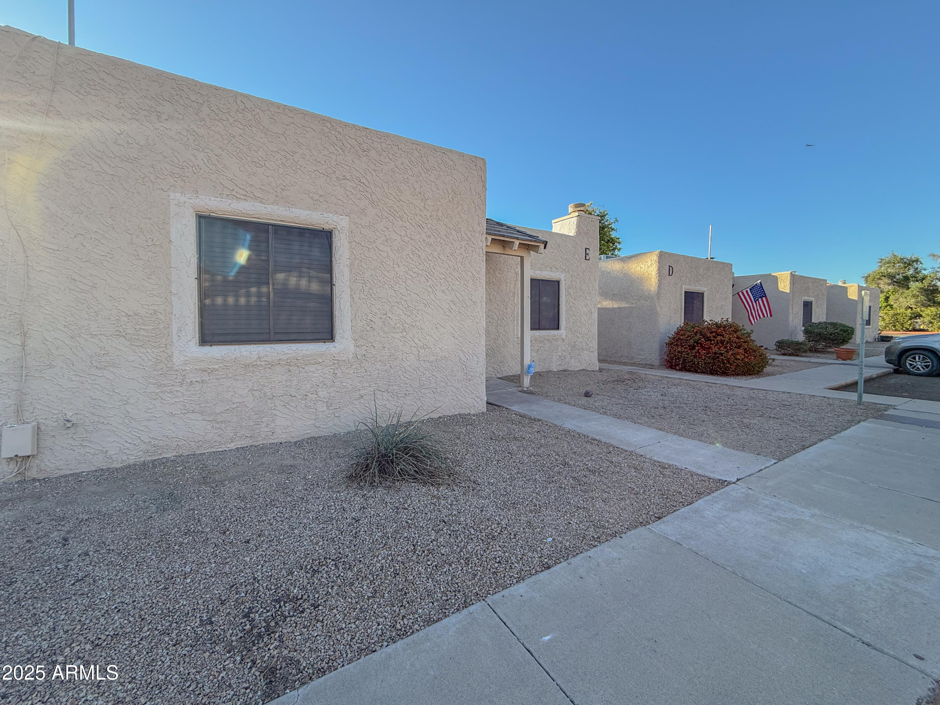 15601 North 27th Street, Unit 14 Phoenix, AZ 85032 - Photo 3 of 16 a house view with a outdoor space