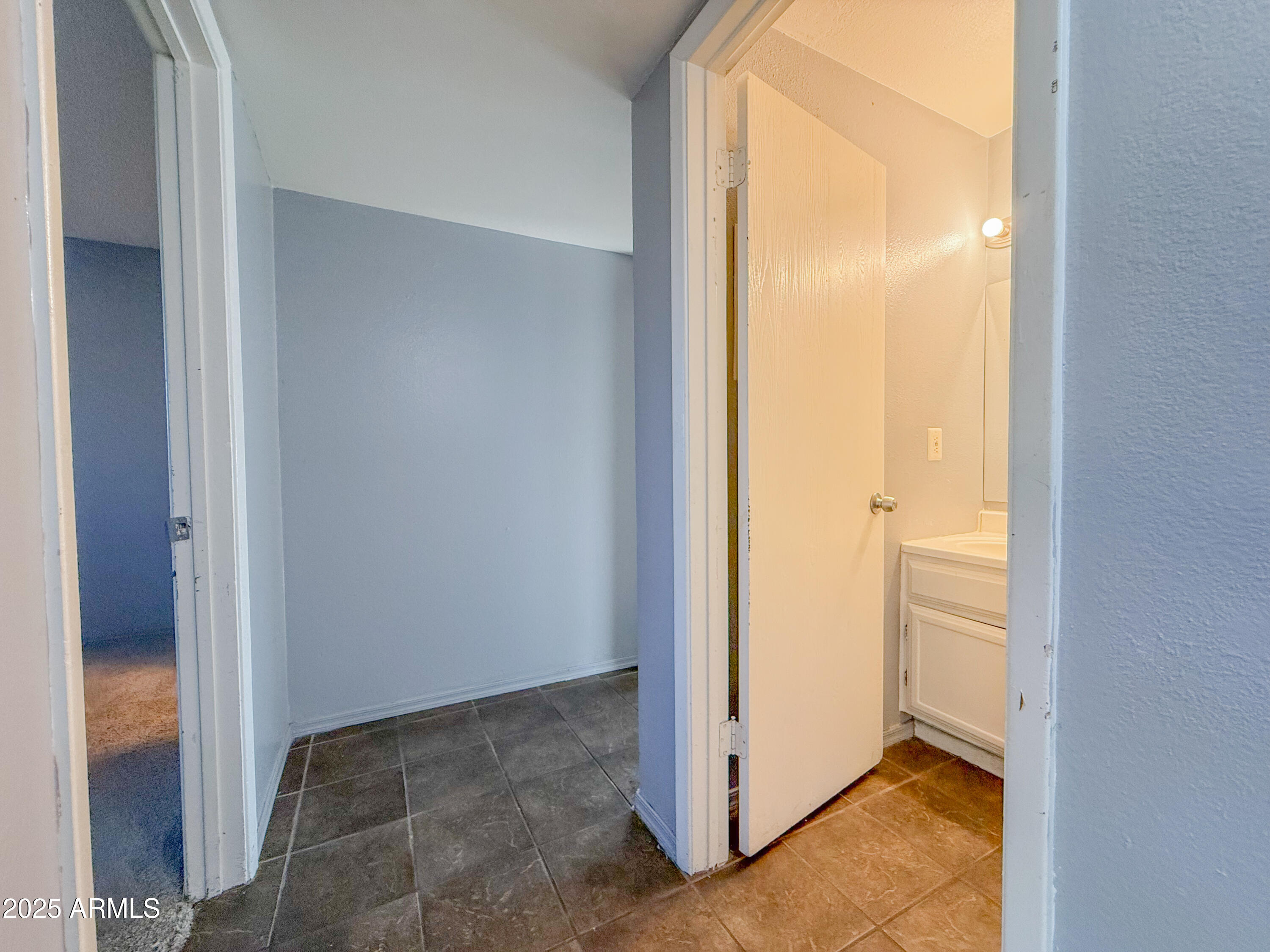 15601 North 27th Street, Unit 14 Phoenix, AZ 85032 - Photo 8 of 16 a view of an empty room