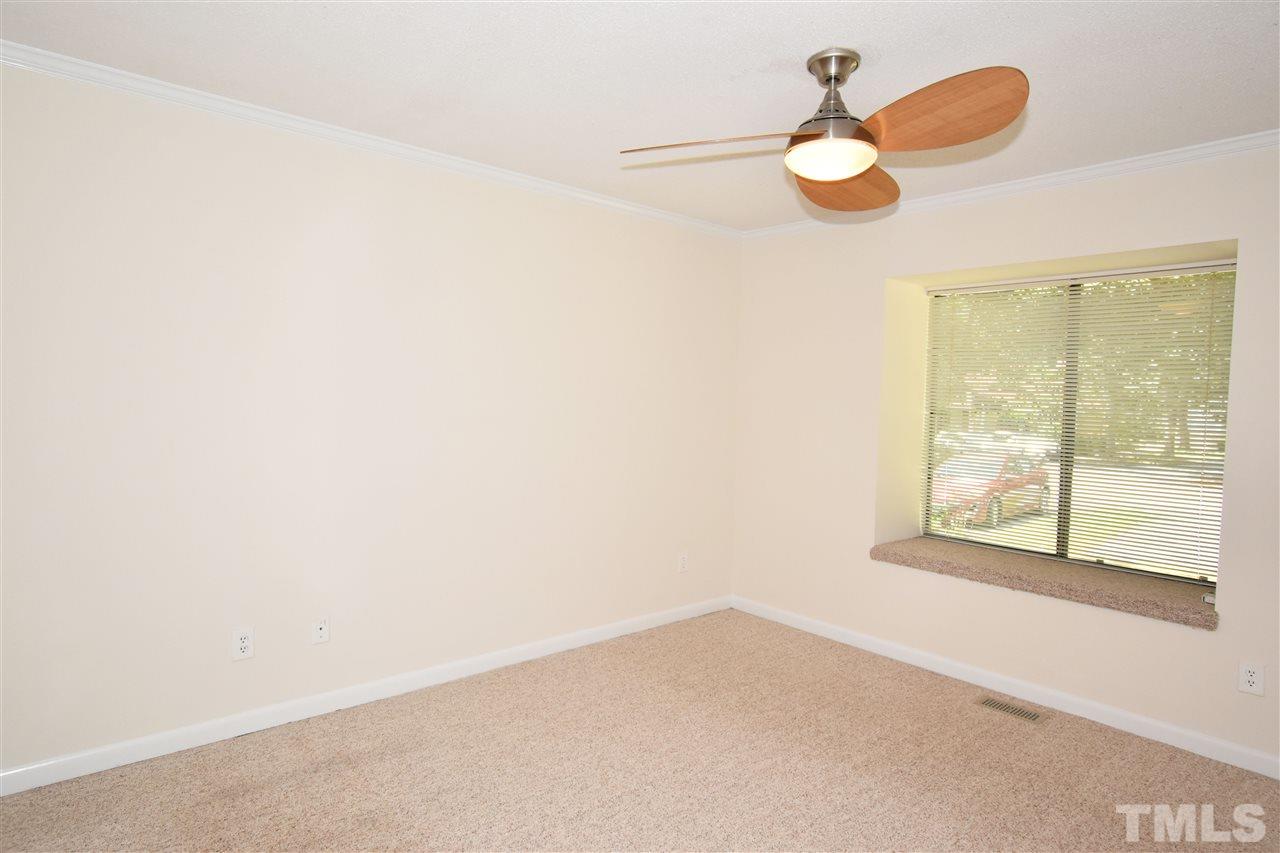 710 Green Ridge Drive Raleigh, NC 27609 - Photo 14 of 26 an empty room with a window