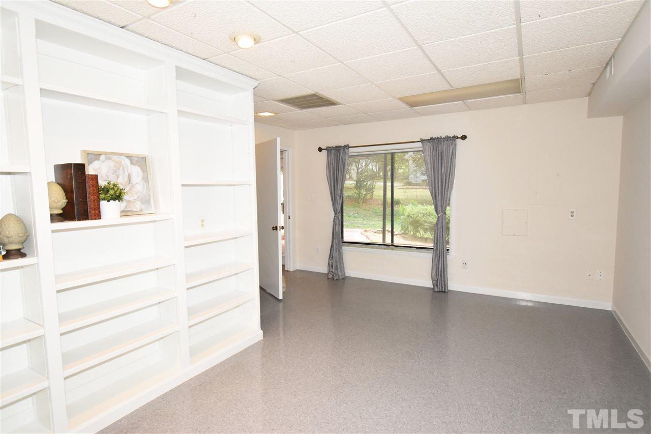 710 Green Ridge Drive Raleigh, NC 27609 - Photo 21 of 26 a view of an empty room and a window